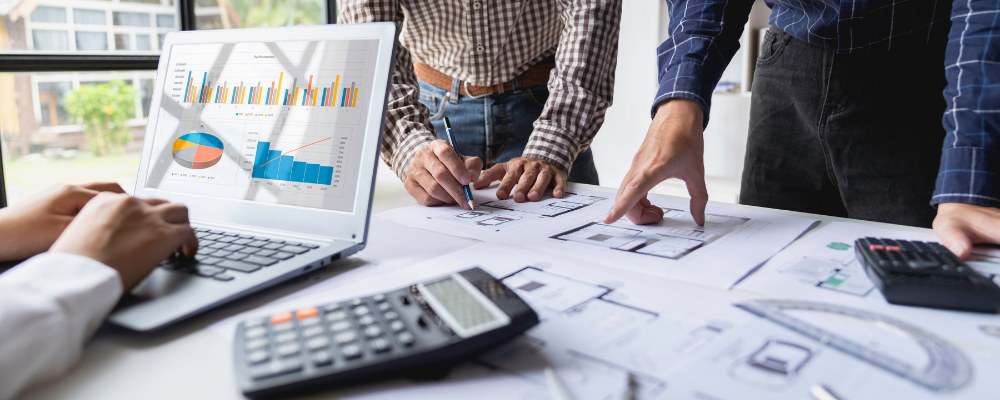A team planning and evaluating the total cost of ownership of an access control project
